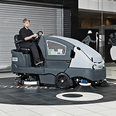 Picture showing a Nilfisk Sweeper being operated in a mall